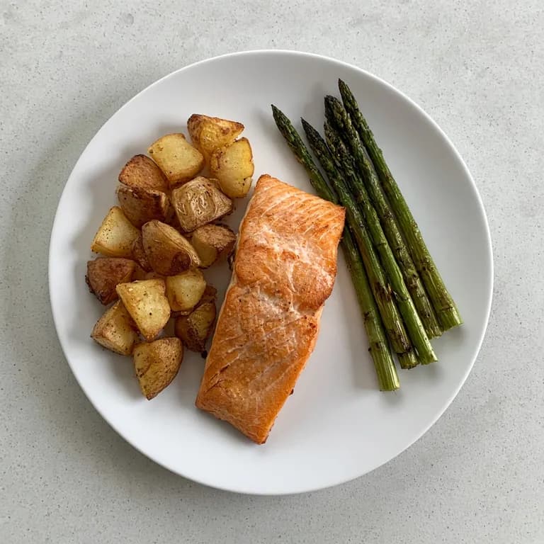 Baked salmon, potatoes, and asparagus