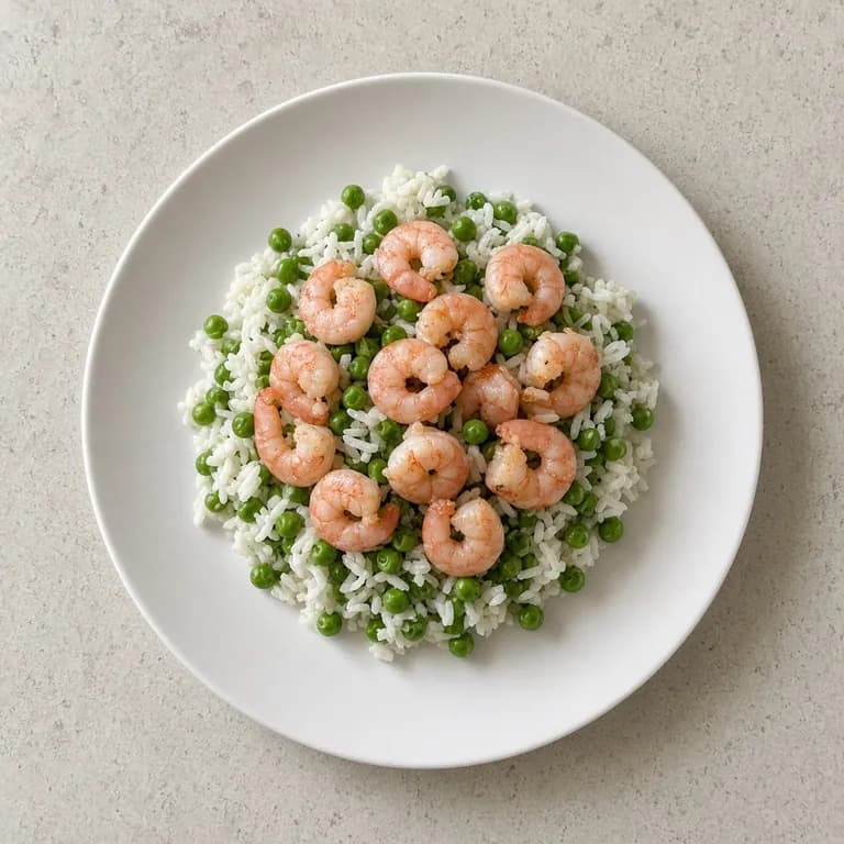 Sautéed shrimp, rice, and peas